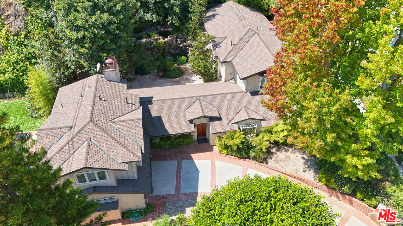 601 Tuallitan Road Los Angeles, CA 90049 - Photo 2 of 23 an aerial view of a house