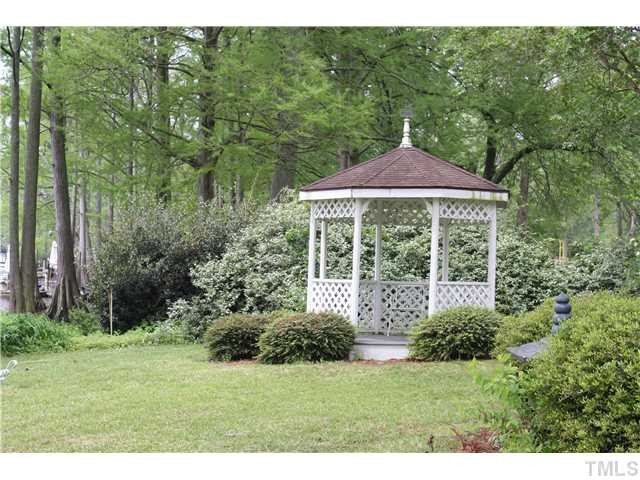 991 Country Club Road Smithfield, NC 27577 - Photo 14 of 16 Gazebo ENHANCES THIS FABULOUSLY LANDSCAPED LOT