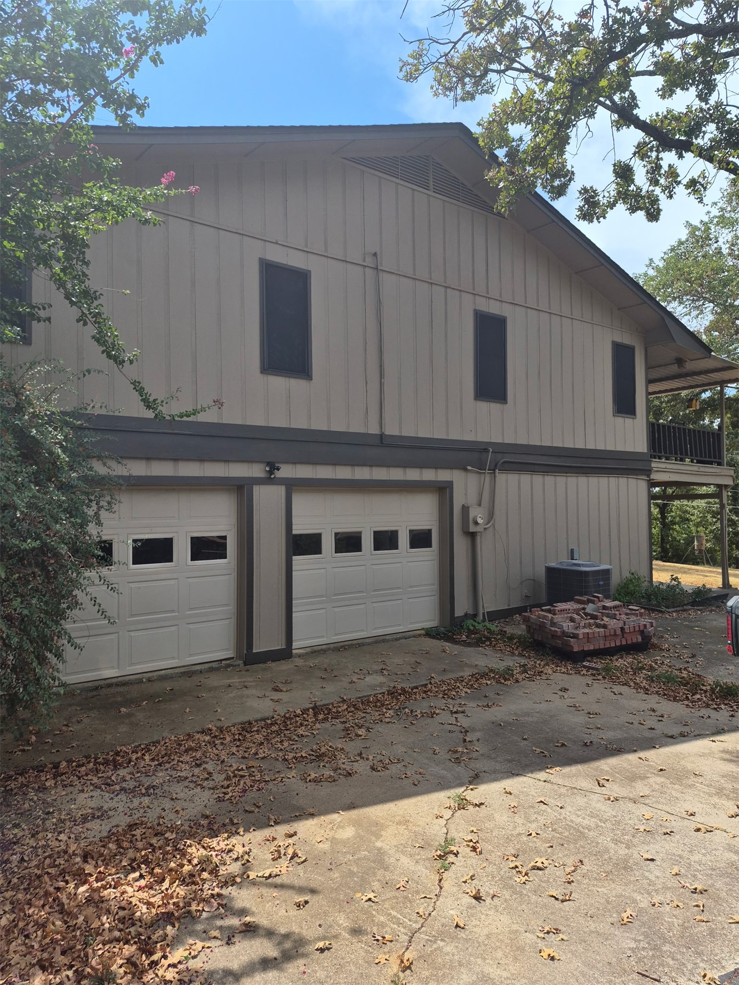 171 Woods Road Mead, OK 73449 - Photo 61 of 62 Two-car garage with panel doors and window inserts