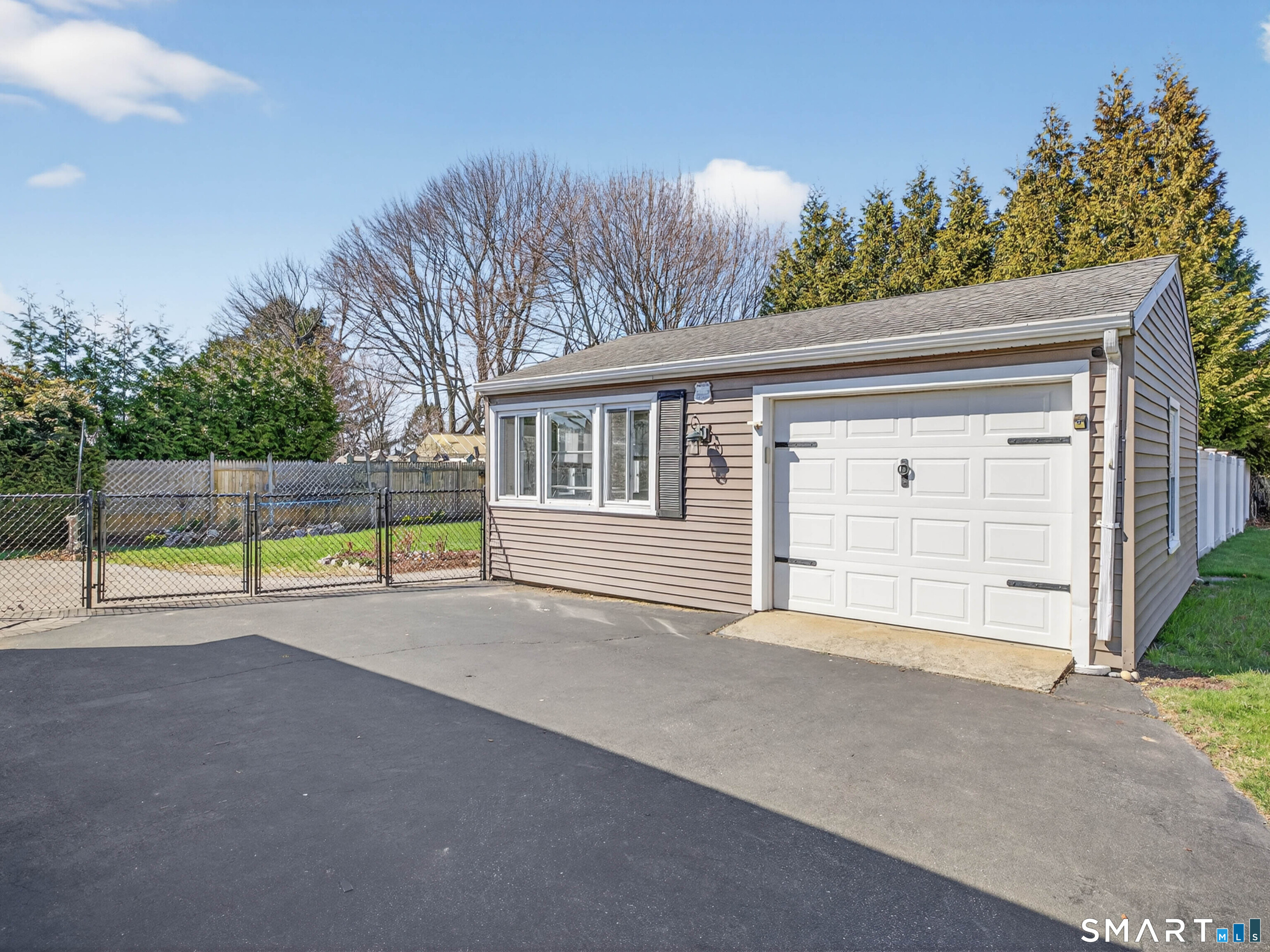 36 Baker Avenue Groton, CT 06340 - Photo 2 of 38 a view of an house with swimming pool and yard