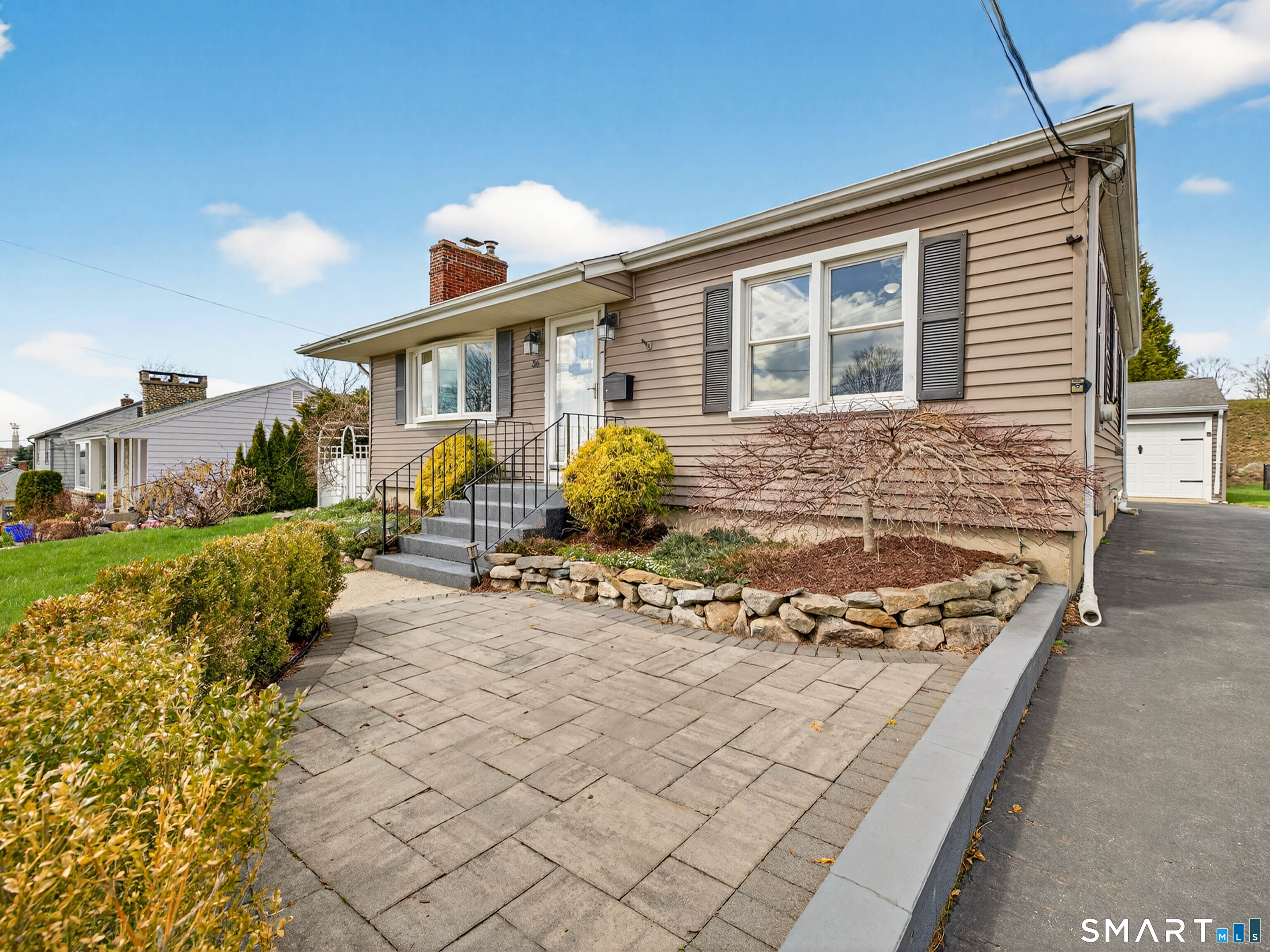 36 Baker Avenue Groton, CT 06340 - Photo 32 of 38 a front view of a house with patio