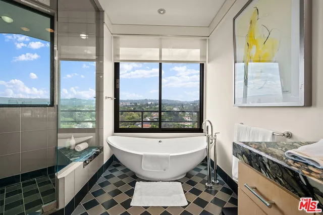 a room with a large window and table