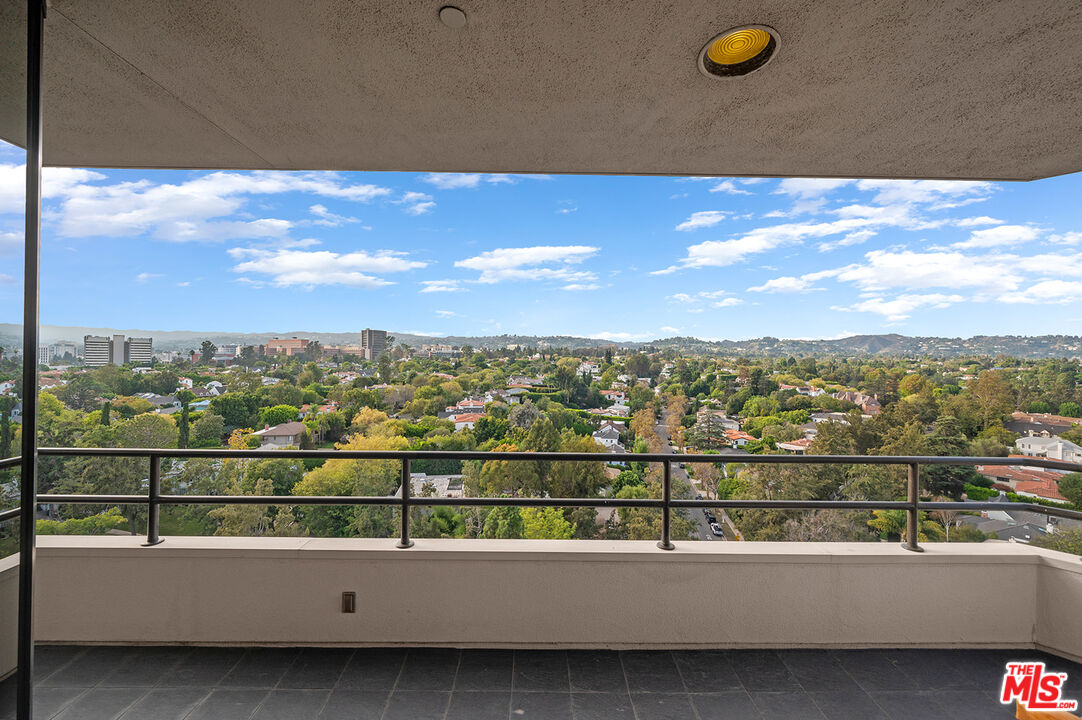 10601 Wilshire Boulevard, Unit 1201 Los Angeles, CA 90024 - Photo 25 of 48 a view of a city from a balcony