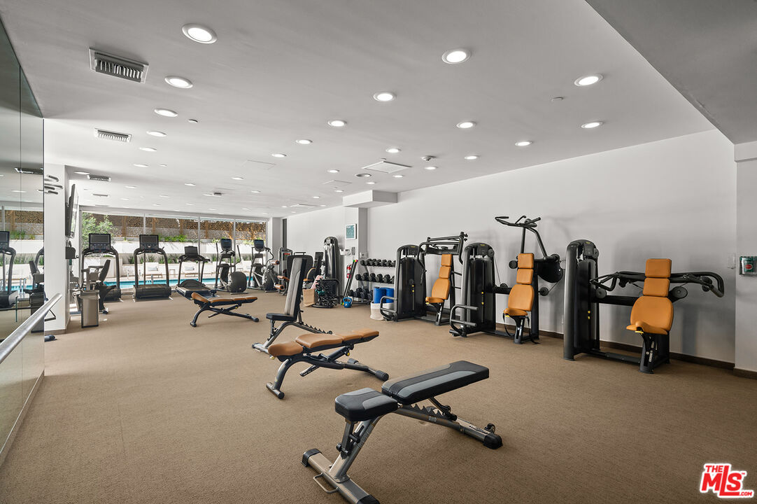 10601 Wilshire Boulevard, Unit 1201 Los Angeles, CA 90024 - Photo 39 of 48 a view of a room with gym equipment