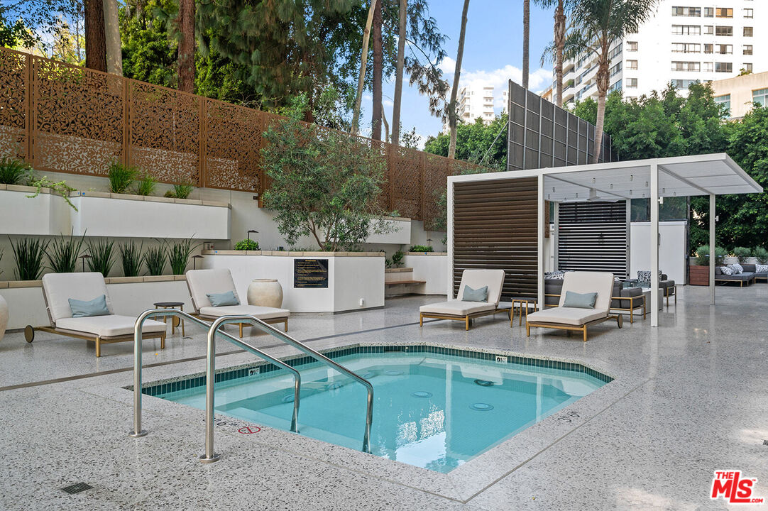 10601 Wilshire Boulevard, Unit 1201 Los Angeles, CA 90024 - Photo 40 of 48 a view of a patio with chairs and tables