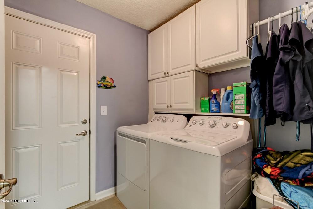 4022 Trail Ridge Road Middleburg, FL 32068 - Photo 19 of 53 Inside lundry With Storage Cabinets