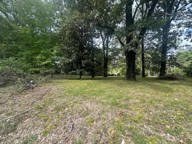 901 South Perkins Road Memphis, TN 38117 - Photo 5 of 10 a view of outdoor space with deck and yard