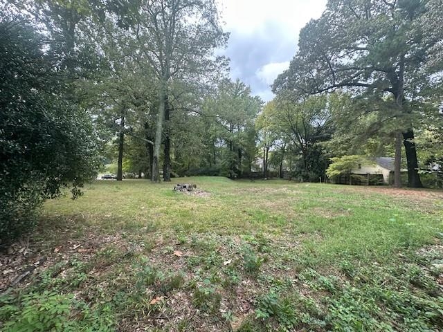 901 South Perkins Road Memphis, TN 38117 - Photo 9 of 10 a view of outdoor space with deck and yard
