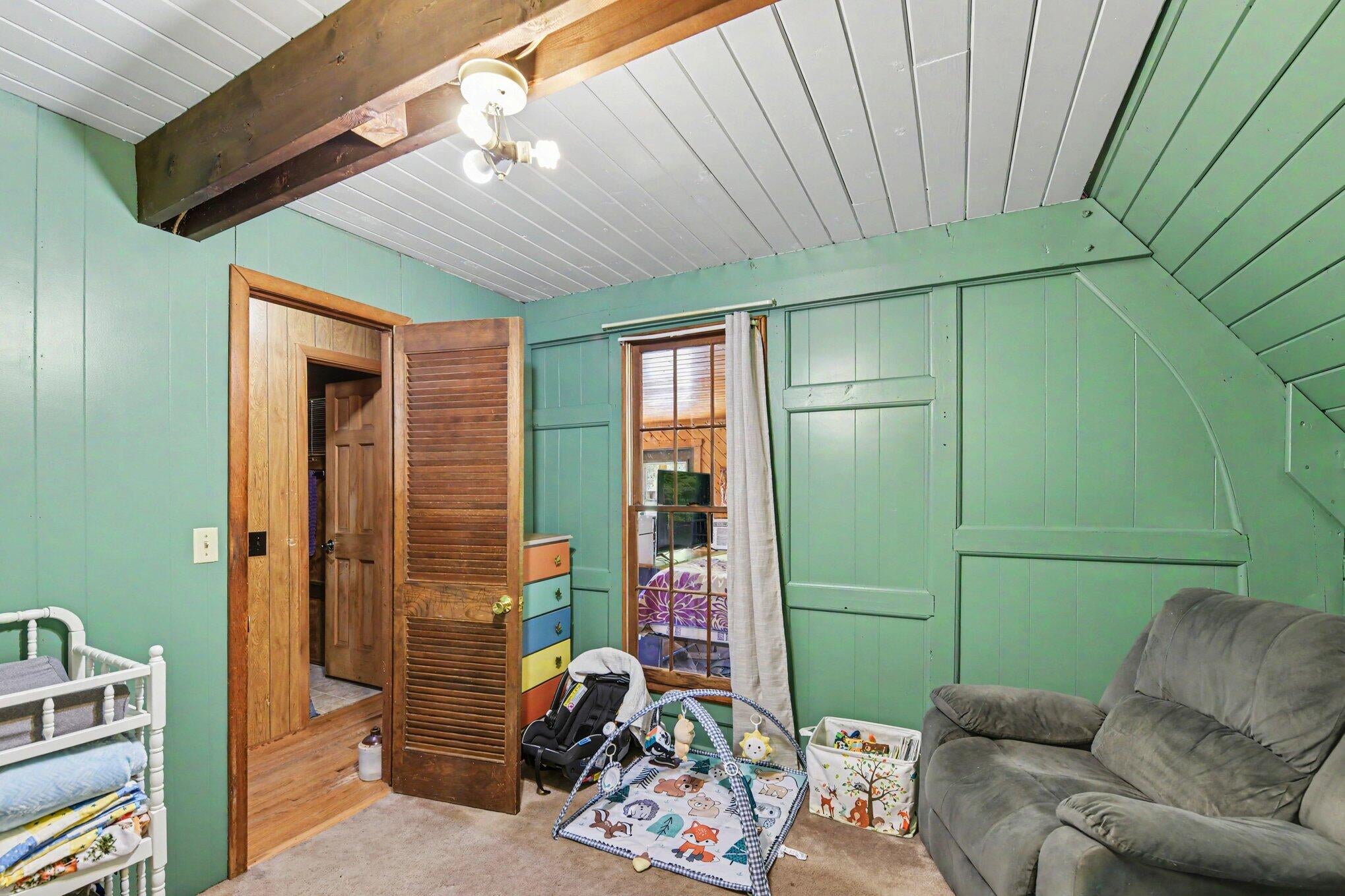 2055 North Springbrook Road Boyne Falls, MI 49713 - Photo 12 of 25 main floor bedroom 2
