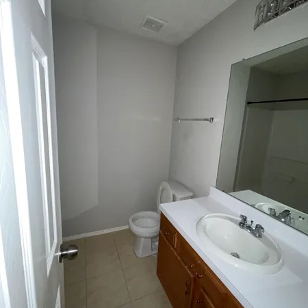 a bathroom with a sink and toilet