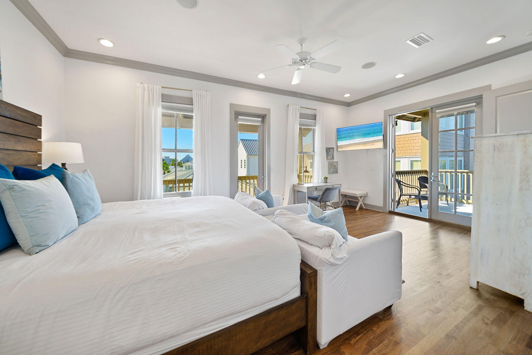 10140 East County Highway 30A, Unit 2 Inlet Beach, FL 32461 - Photo 14 of 92 a spacious bedroom with a large bed and windows