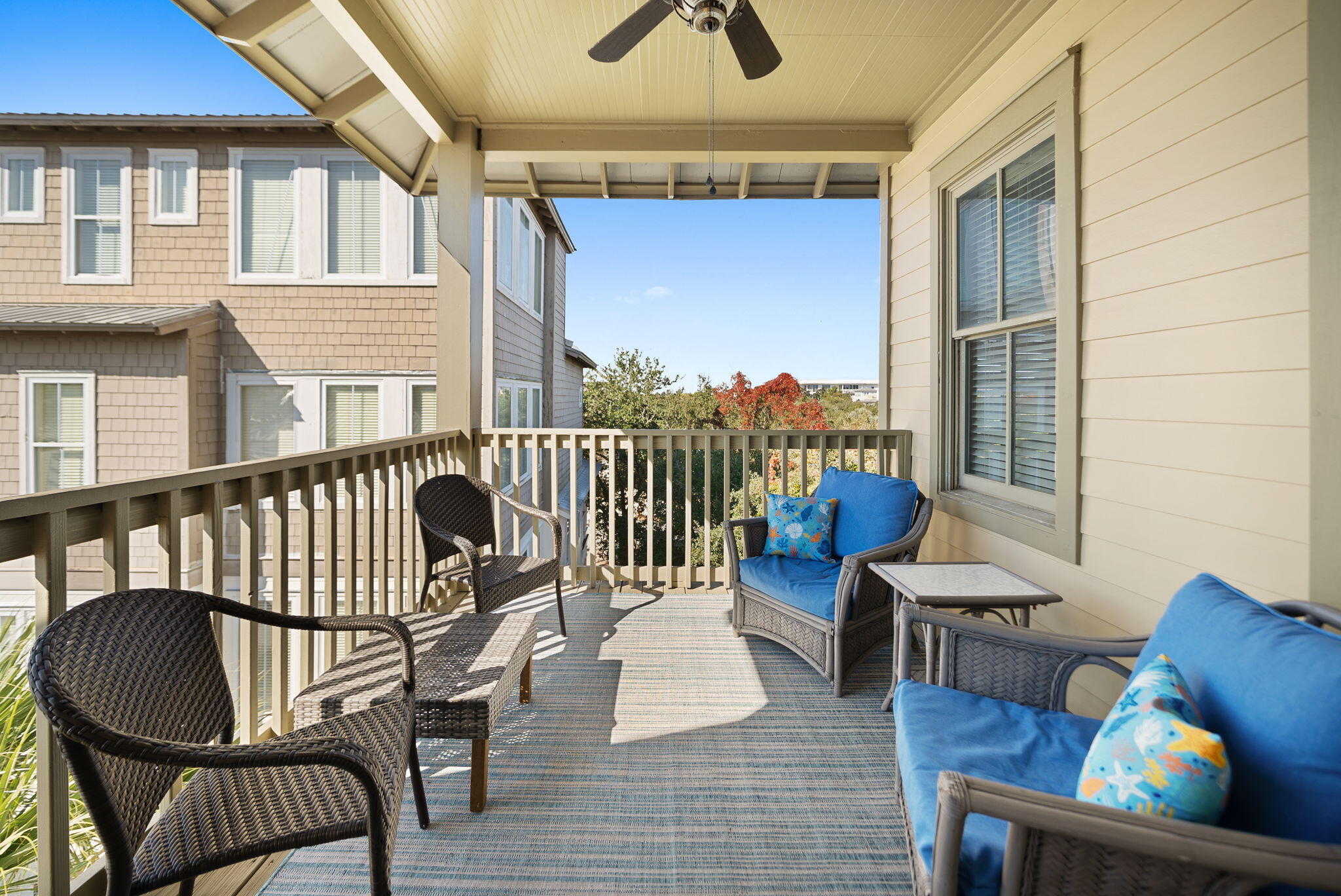 10140 East County Highway 30A, Unit 2 Inlet Beach, FL 32461 - Photo 17 of 92 a view of a chair and tables front of the house