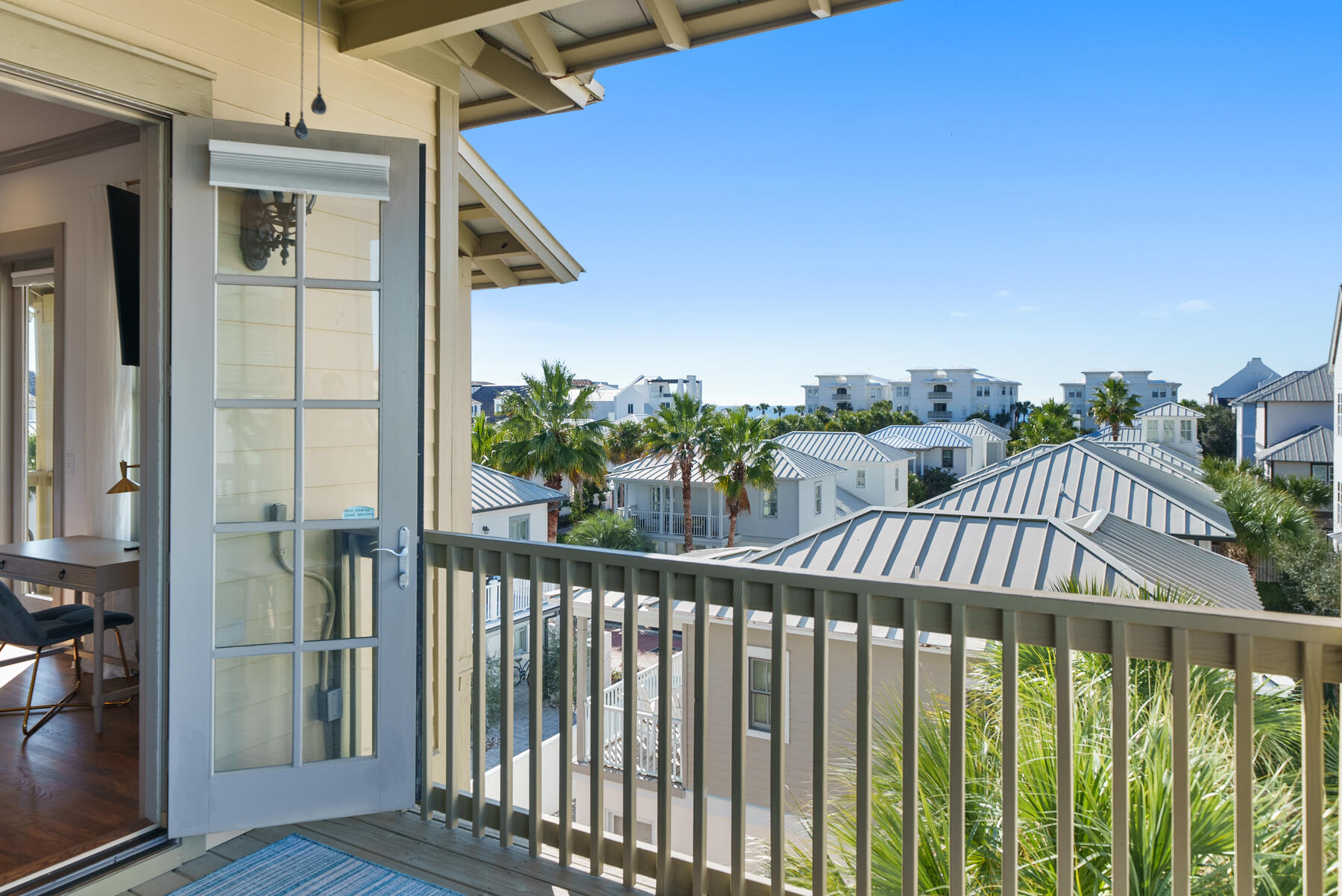 10140 East County Highway 30A, Unit 2 Inlet Beach, FL 32461 - Photo 19 of 92 a view of a balcony with wooden floor