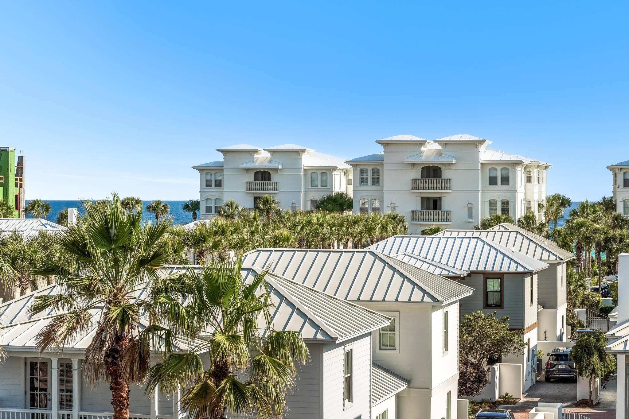10140 East County Highway 30A, Unit 2 Inlet Beach, FL 32461 - Photo 2 of 92 a front view of a house with a garden