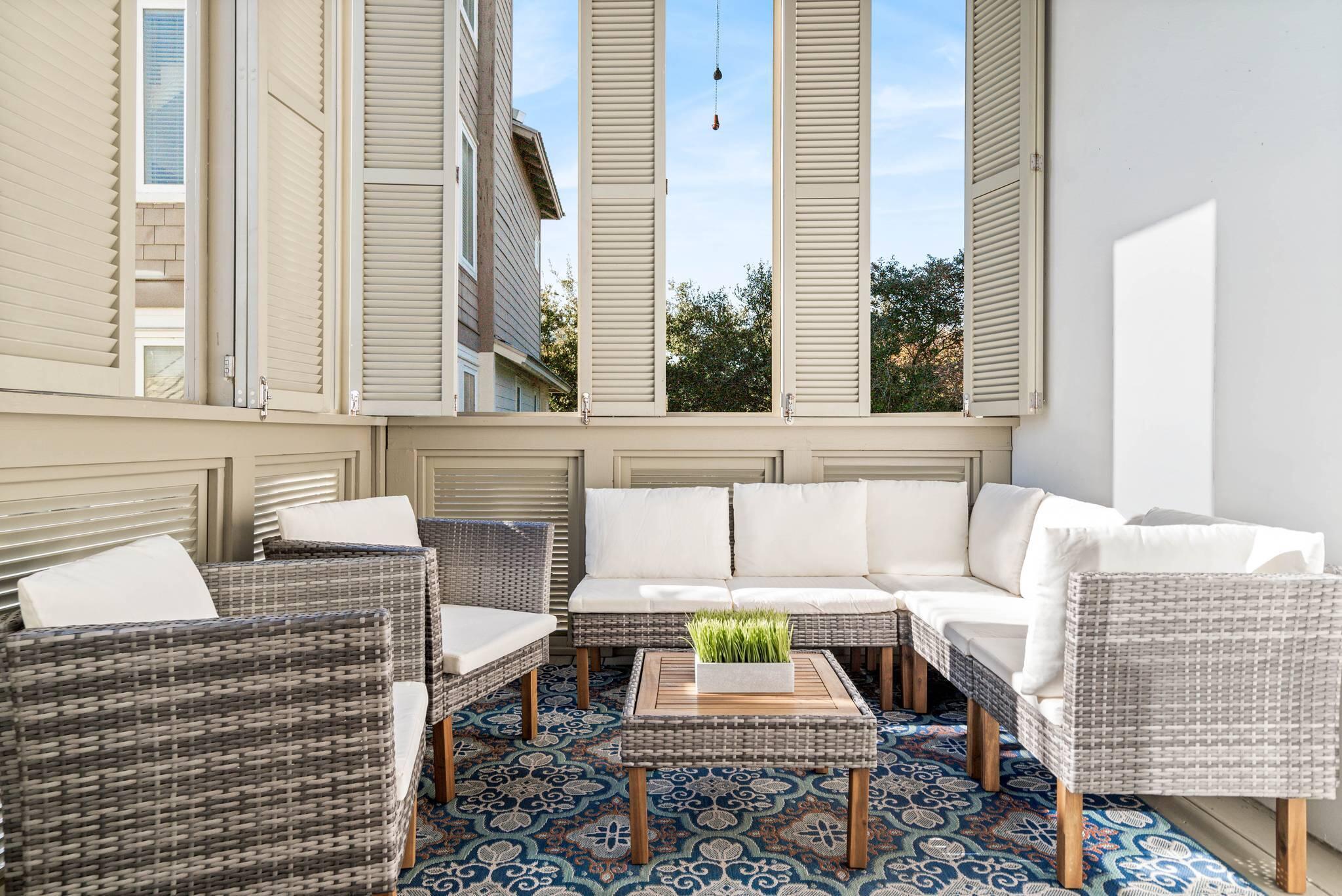 10140 East County Highway 30A, Unit 2 Inlet Beach, FL 32461 - Photo 31 of 92 a living room with furniture and large windows