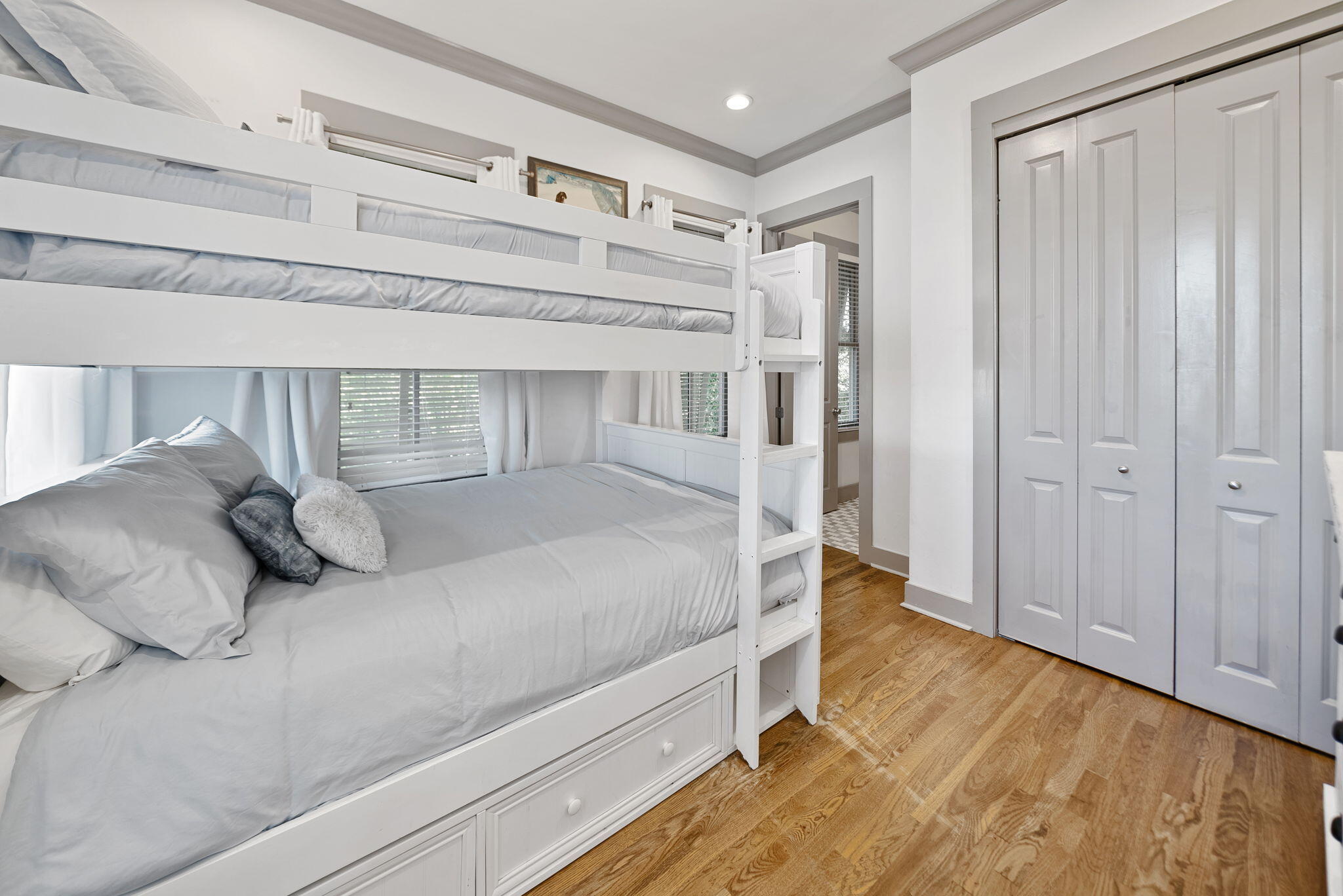 10140 East County Highway 30A, Unit 2 Inlet Beach, FL 32461 - Photo 47 of 92 a bedroom with a large bed and wooden floor