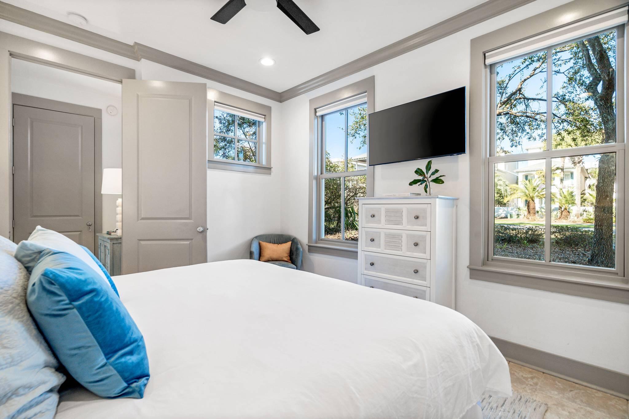 10140 East County Highway 30A, Unit 2 Inlet Beach, FL 32461 - Photo 52 of 92 a bedroom with a bed tv and window