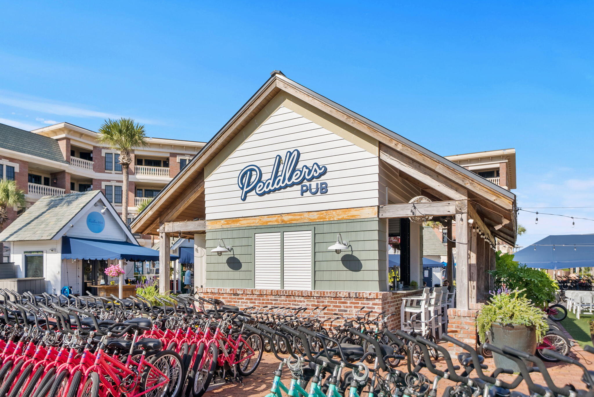 10140 East County Highway 30A, Unit 2 Inlet Beach, FL 32461 - Photo 66 of 92 a view of a house with large trees and plants