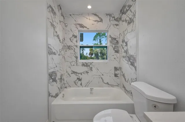 a view of a room that has a window