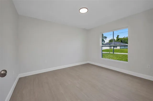 a view of an empty room and window