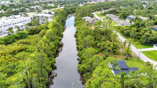 a view of a garden with a lake view