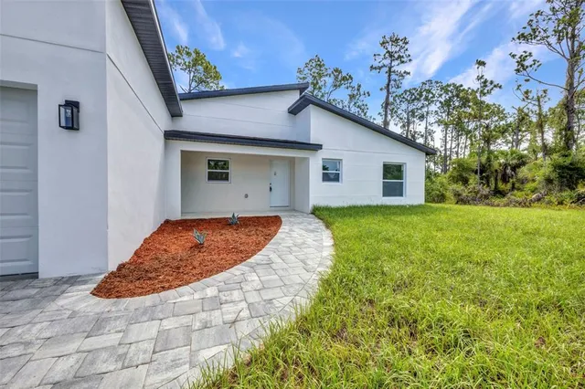 a house view with a outdoor space
