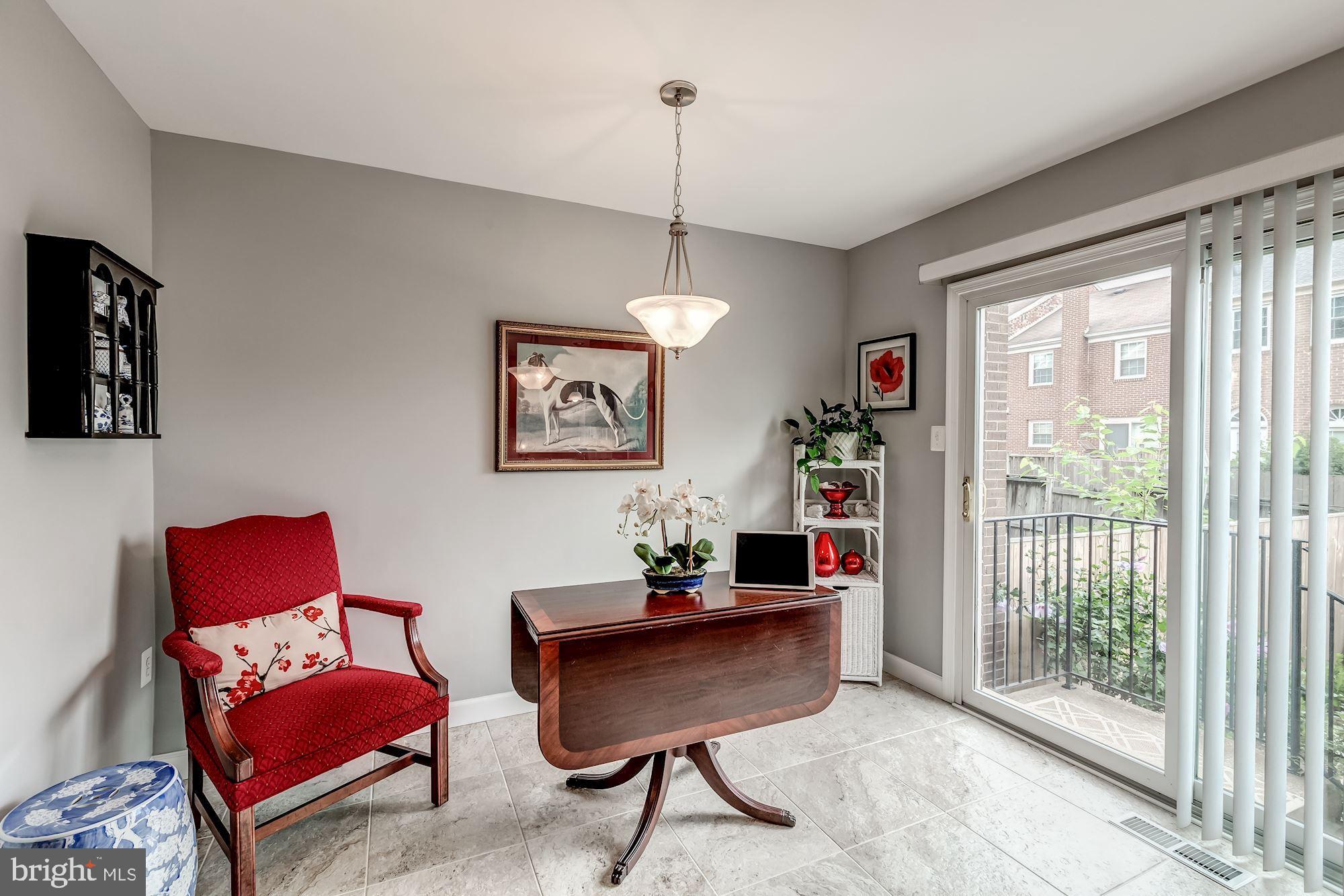 8118 Rhodell Lane Springfield, VA 22153 - Photo 22 of 46 Kitchen Table space. Walk out to Patio