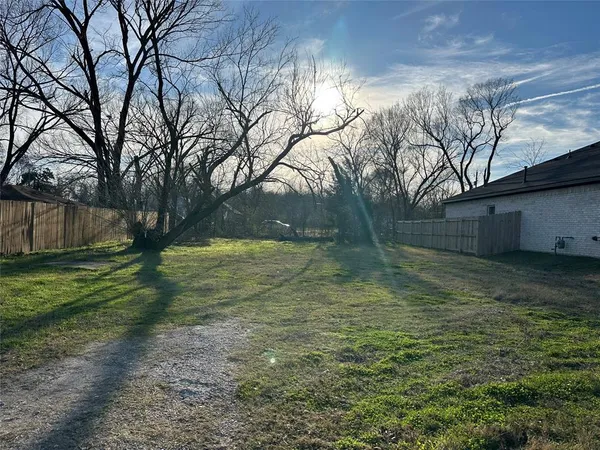 a view of backyard with green space