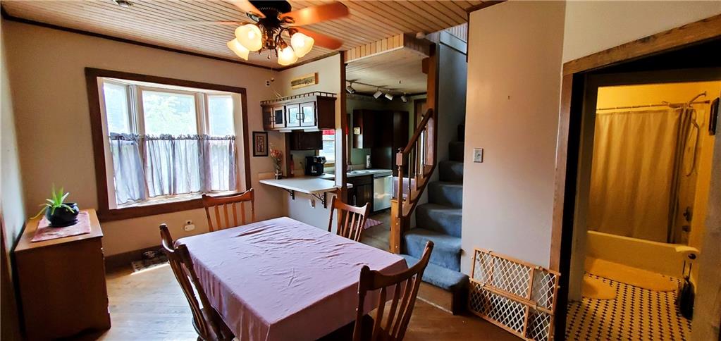 115 Country Club Road Butler, PA 16002 - Photo 7 of 50 a dining room with furniture window and wooden floor