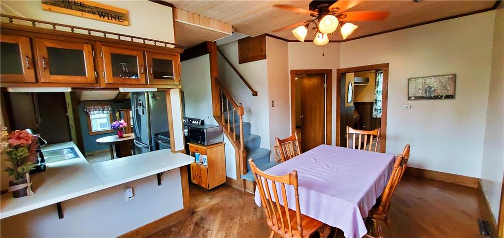 115 Country Club Road Butler, PA 16002 - Photo 9 of 50 a view of a dining room with furniture and wooden floor