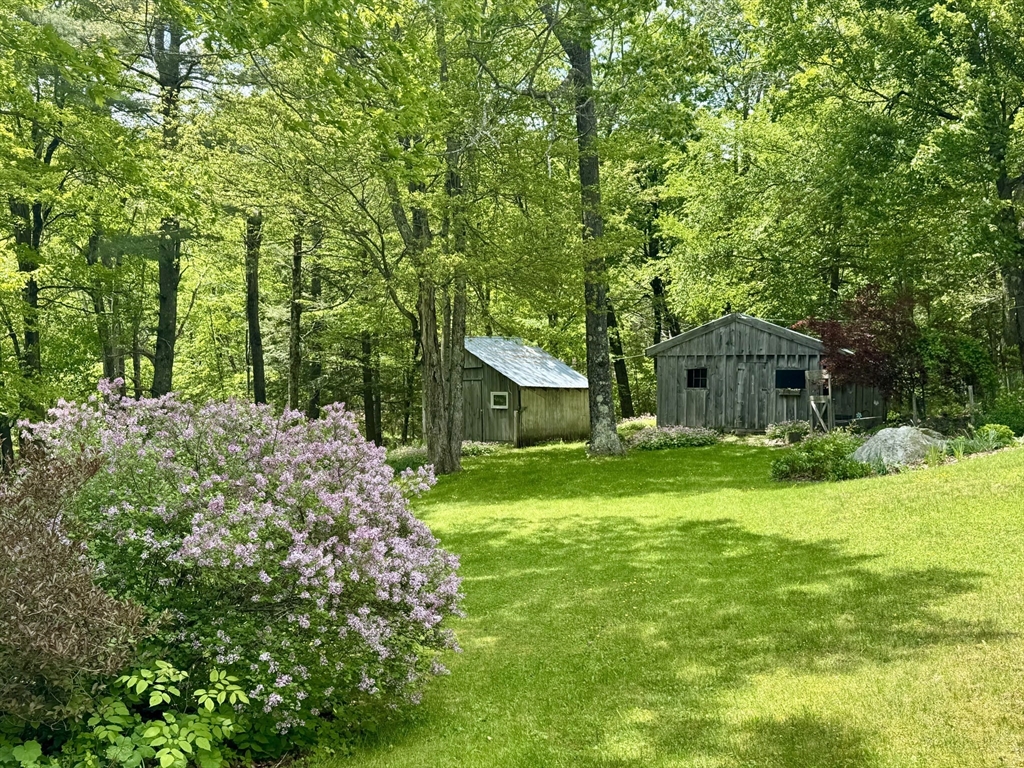 1450 W Road Ashfield, MA 01330 - Photo 34 of 36 a front view of a house with garden