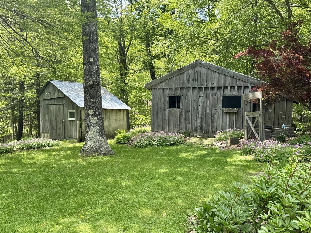 1450 W Road Ashfield, MA 01330 - Photo 4 of 36 a view of a house with backyard and garden