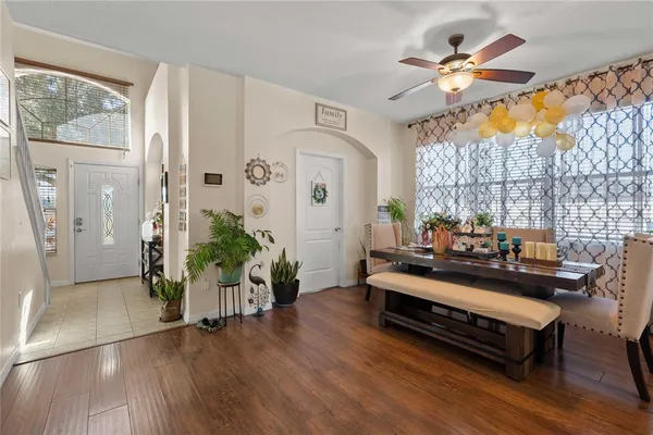 a kitchen with stainless steel appliances a stove sink microwave and cabinets