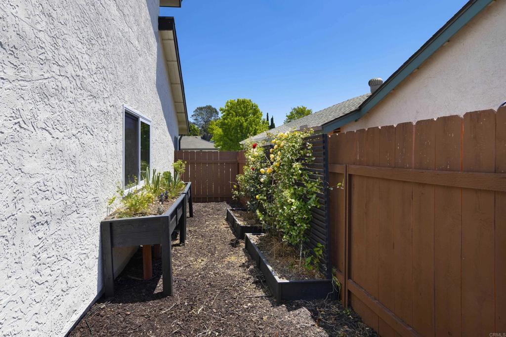 3577 Winslow Road Oceanside, CA 92056 - Photo 35 of 53 a backyard of a house with lots of green space