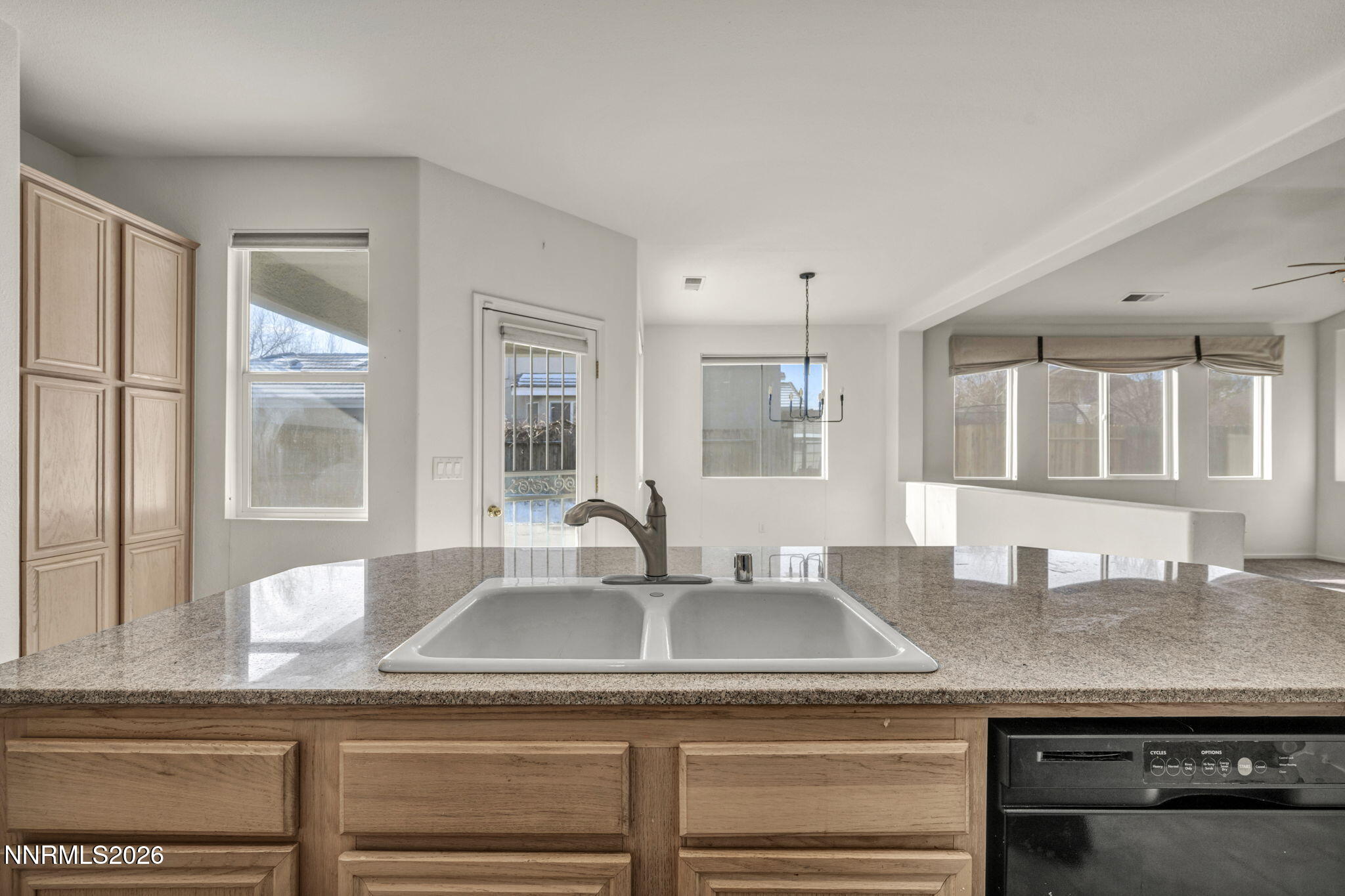 1472 Gaucho Lane Reno, NV 89521 - Photo 19 of 38 a kitchen with a sink and a window