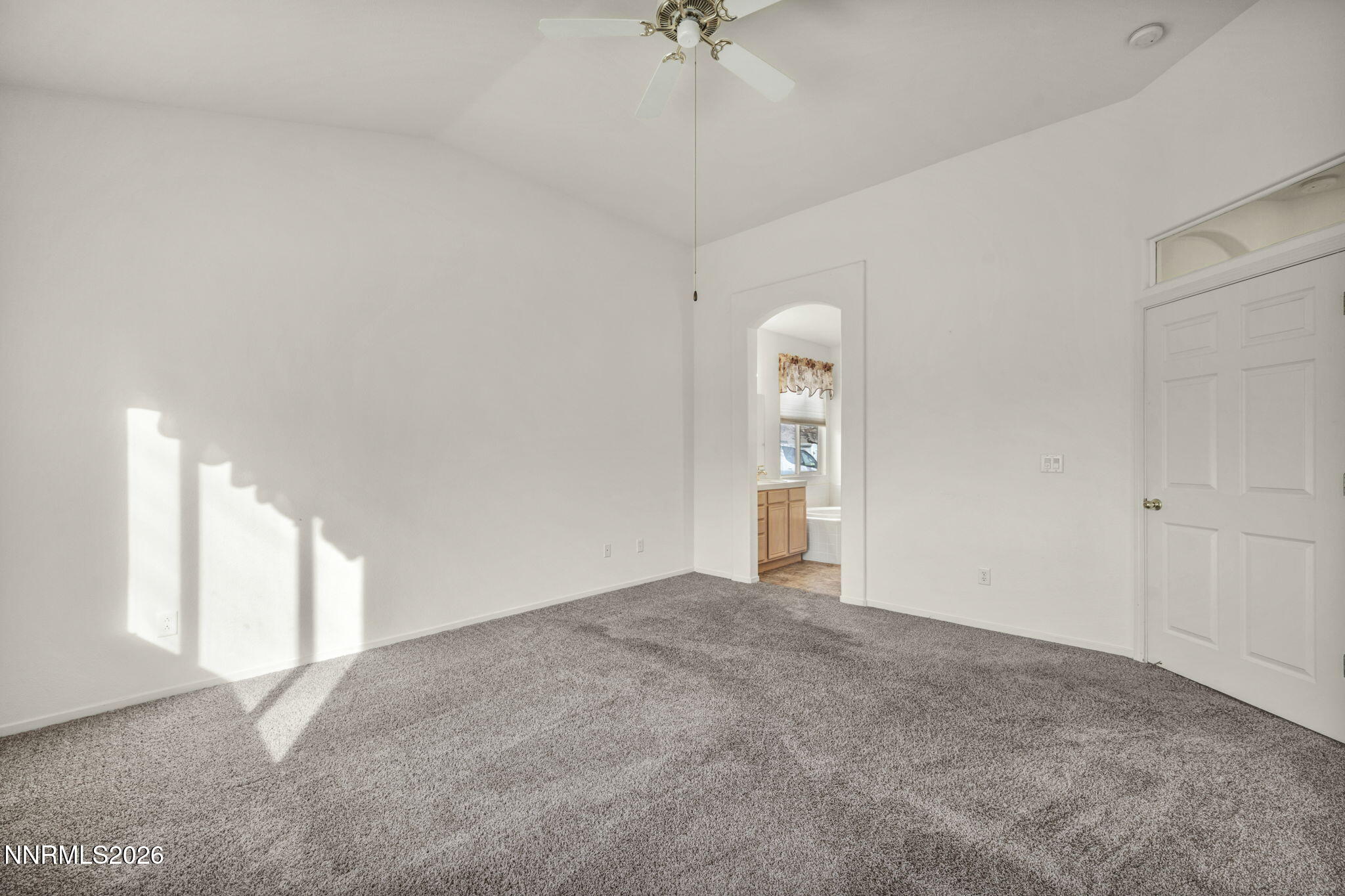 1472 Gaucho Lane Reno, NV 89521 - Photo 24 of 38 a view of an empty room with a window