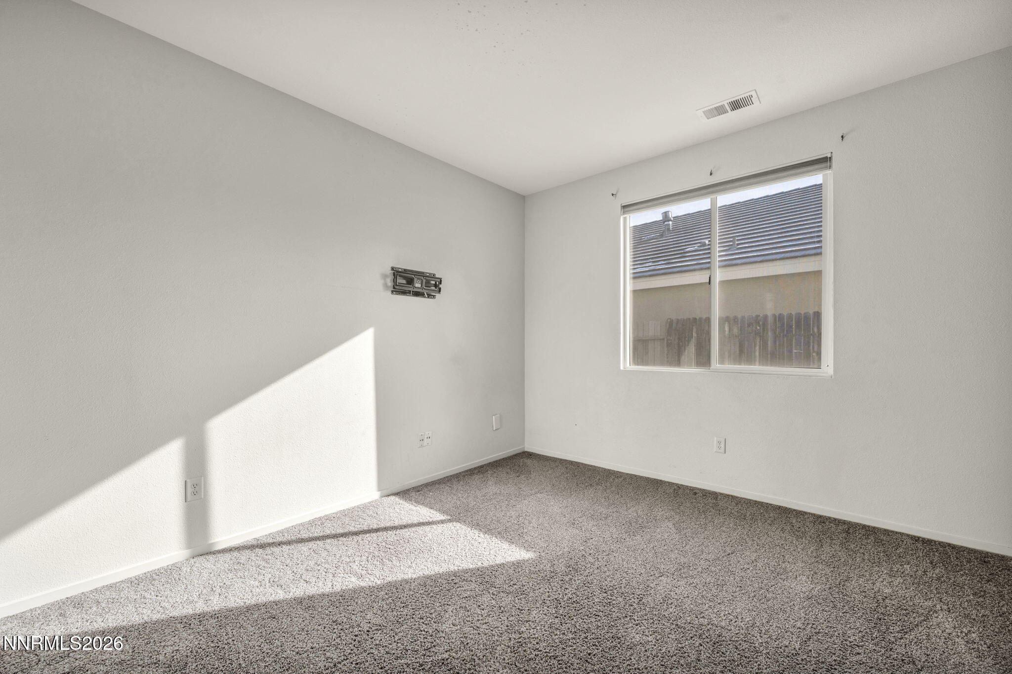 1472 Gaucho Lane Reno, NV 89521 - Photo 32 of 38 an empty room with windows
