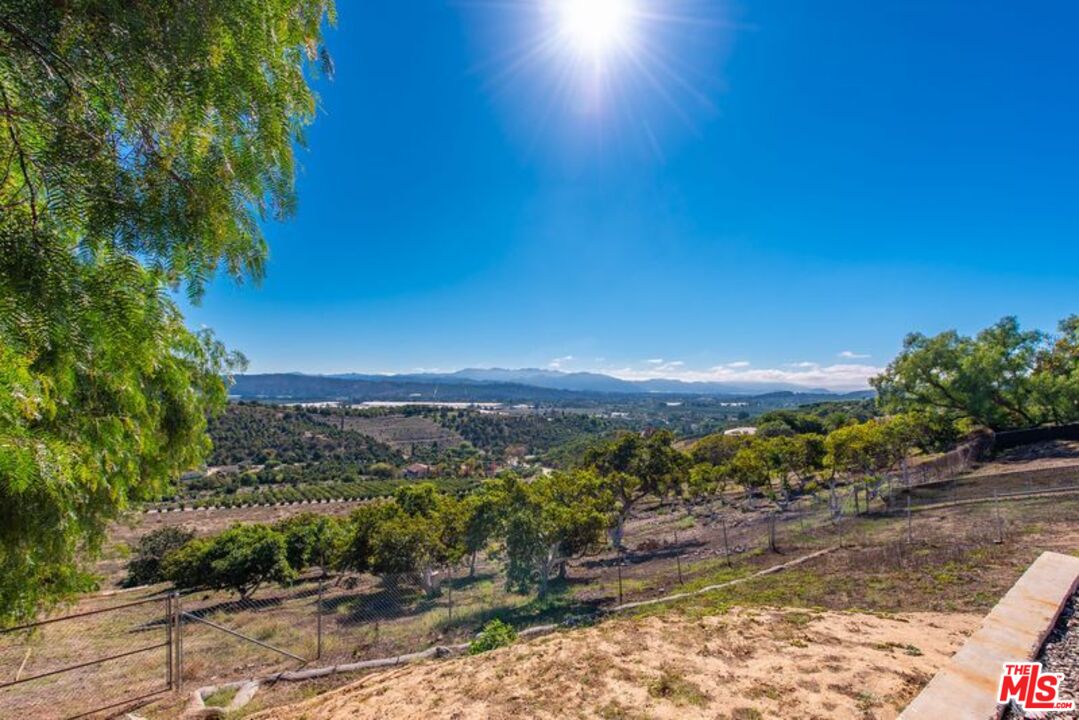 6312 Ridgecrest Lane Somis, CA 93066 - Photo 17 of 25 a view of a lake with a yard