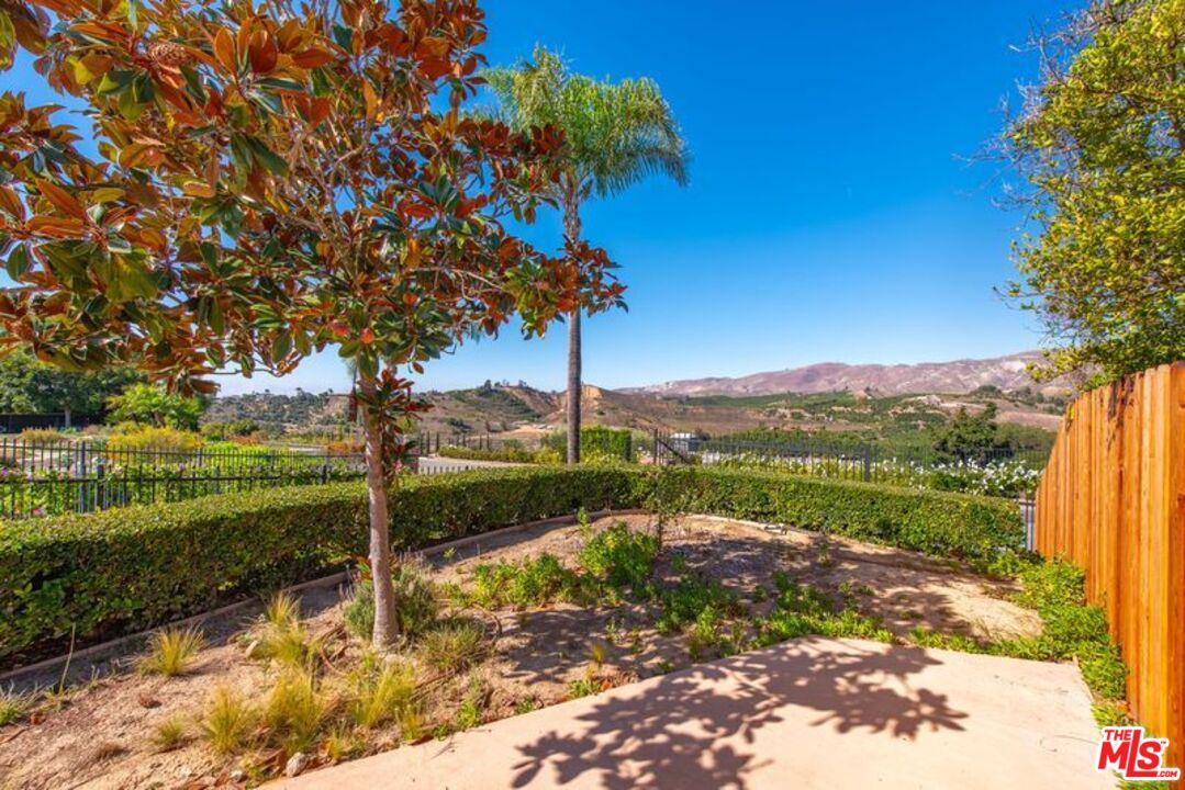 6312 Ridgecrest Lane Somis, CA 93066 - Photo 19 of 25 a view of a garden with a tree