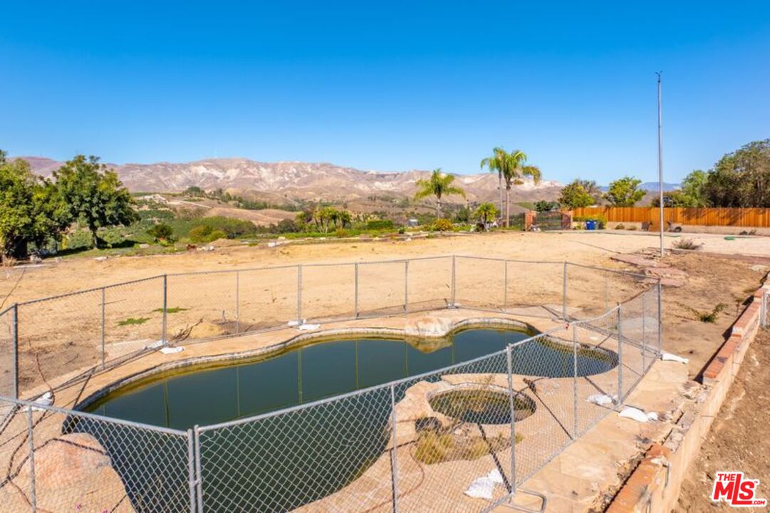 6312 Ridgecrest Lane Somis, CA 93066 - Photo 22 of 25 a view of a swimming pool and lake view