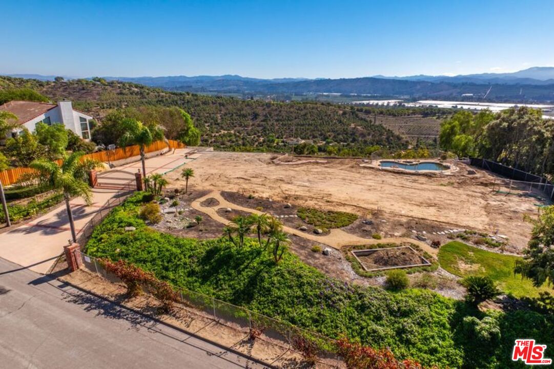 6312 Ridgecrest Lane Somis, CA 93066 - Photo 8 of 25 a view of a lake with a mountain in the background