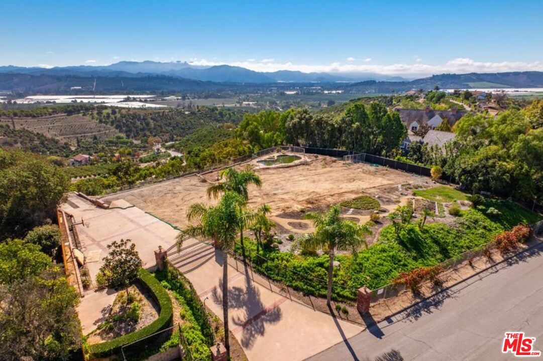 6312 Ridgecrest Lane Somis, CA 93066 - Photo 9 of 25 a view of a lake with a mountain in the background