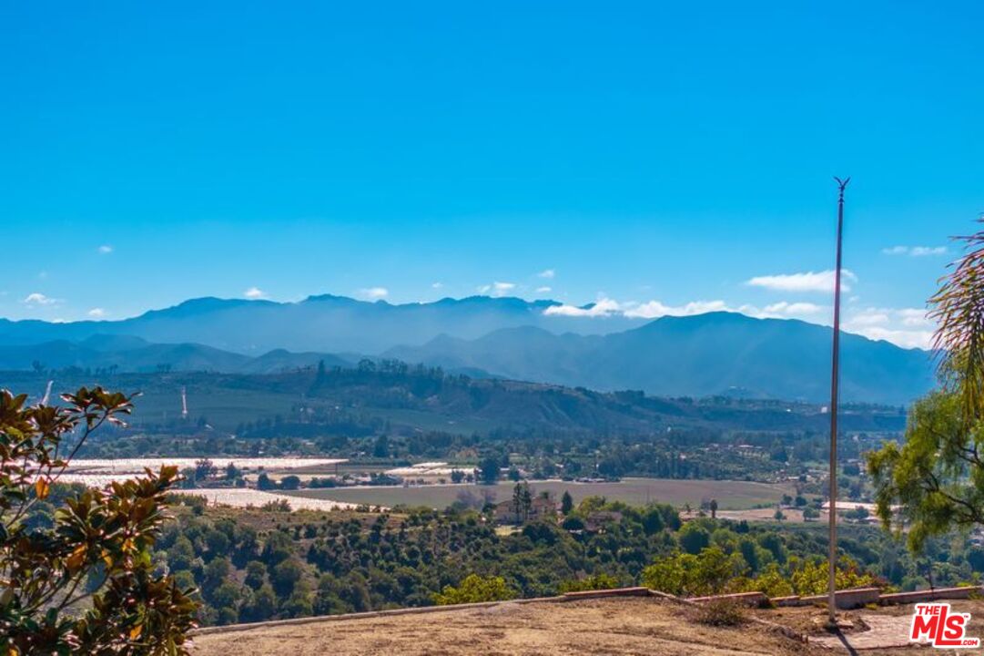 6312 Ridgecrest Lane Somis, CA 93066 - Photo 10 of 25 a view of a lake with mountains in the background