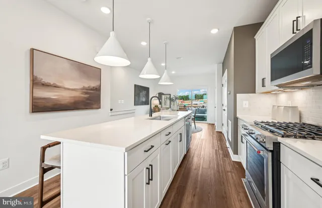 a bathroom with a sink and mirror