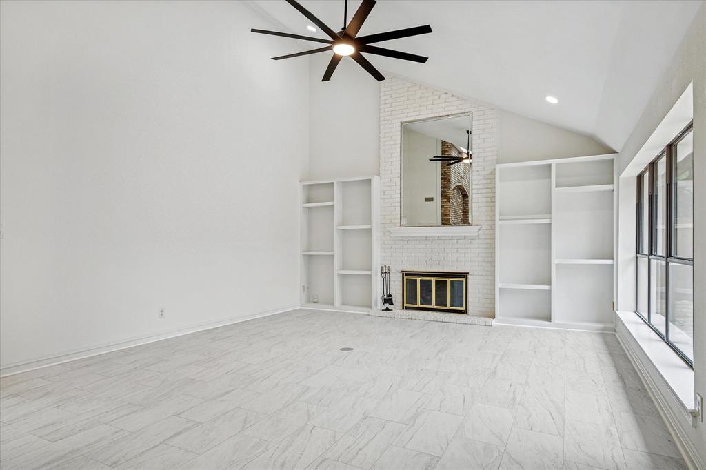 62 Legend Road Benbrook, TX 76132 - Photo 3 of 27 a view of a livingroom with a ceiling fan window and a ceiling fan