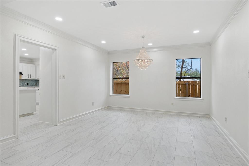 62 Legend Road Benbrook, TX 76132 - Photo 7 of 27 an empty room with windows and closet