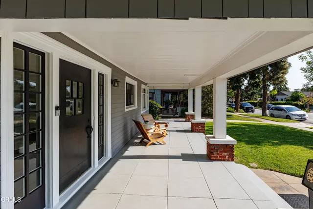 a outdoor space with patio the couches and a dining table with garden view