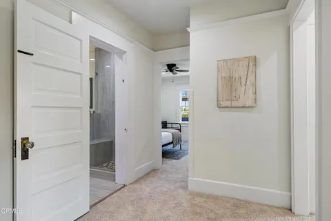 a bathroom with a tub and a window