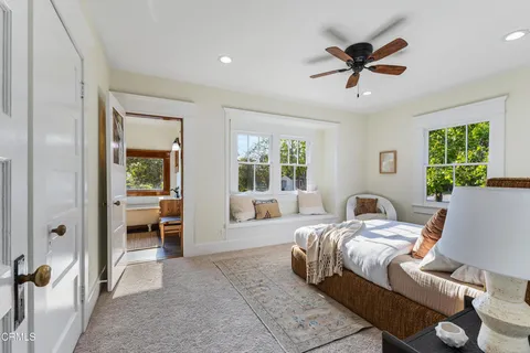 a workspace with furniture and window