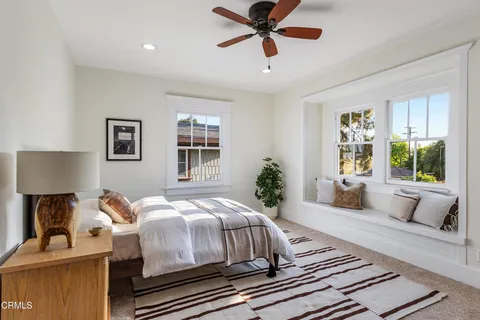 a bathroom with a tub and shower